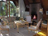 Das gem&uuml;tliche Wohnzimmer bietet viel Platz zum famili&auml;ren Beisammensein.