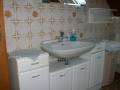 Das Bad mit Dusche und WC